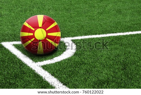 The flag of Macedonia is depicted on a football, with a good place for your text