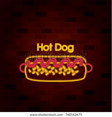 hot dog on neon sign on brick wall