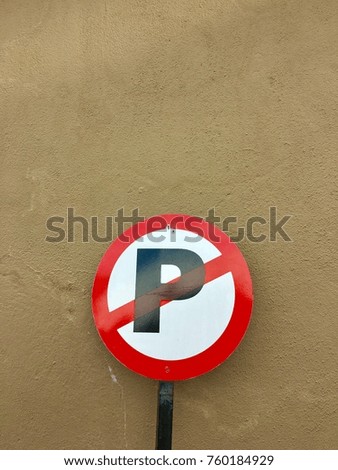 no parking sign isolated on wall