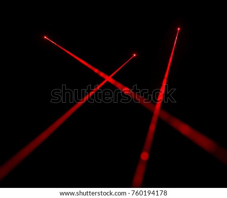 Red laser beams on black background Royalty-Free Stock Photo #760194178