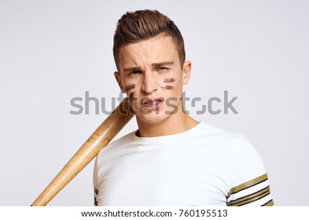 man with a baseball bat                               