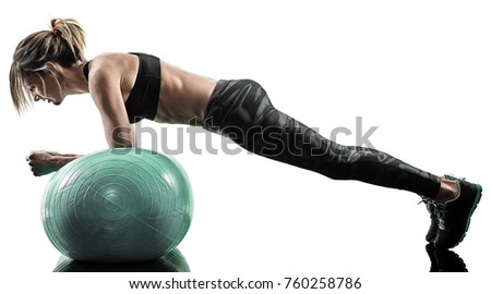 one caucasian woman exercising pilates fitness swiss ball exercises isolated  silhouette on white background