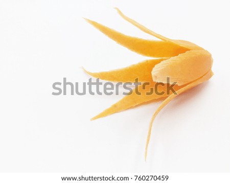 Carved Flower made of Carrot on white Background