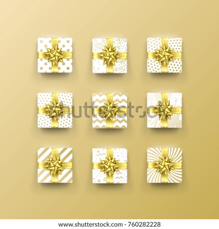 Christmas Gift box present in golden ribbon bow and wrapping paper dotted pattern. Vector Christmas gold foil gift boxes set isolated on white background for New Year holiday or Birthday greeting card