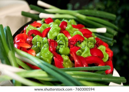 Fresh vegetable mix with red and green pepper and garden onion