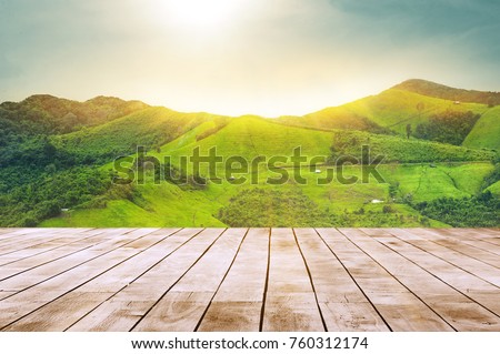 white wooden table top with the mountain landscape