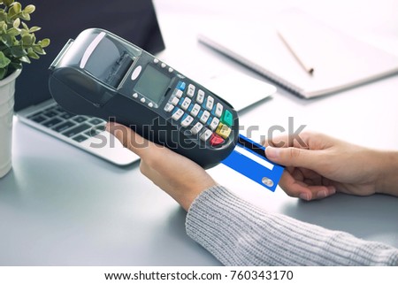Hands holding  plastic credit card payment shopping with  credit card for Online payment 