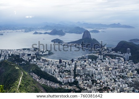 Misty and cloudy skyline of the town of Rio de Janeiro, Brazil with Sugarloaf Mountain overlooking the Atlantic Ocean