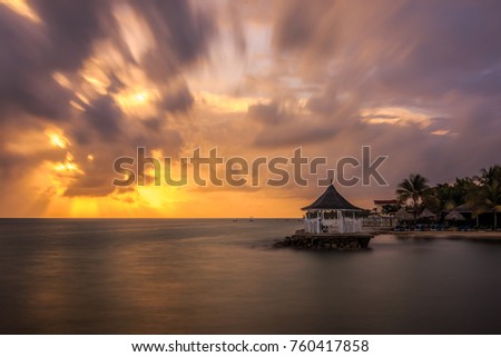 A beautiful sunrise in Runaway Bay, St Ann, Jamaica Royalty-Free Stock Photo #760417858