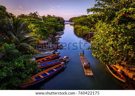 Rafting on the White River  in St Ann, Jamaica. Royalty-Free Stock Photo #760422175
