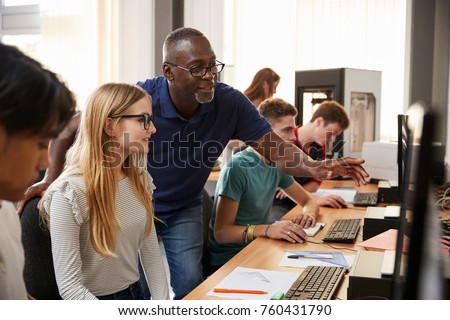 Design Students With Teacher Working In CAD/3D Printing Lab Royalty-Free Stock Photo #760431790
