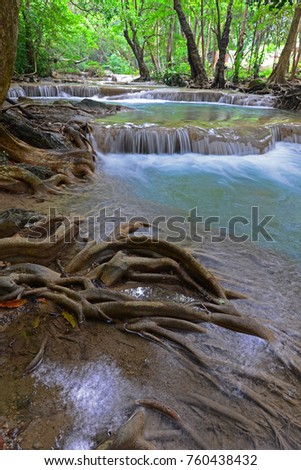 Feather and falls, Waterfalls in Erawan National Park, Thailand.