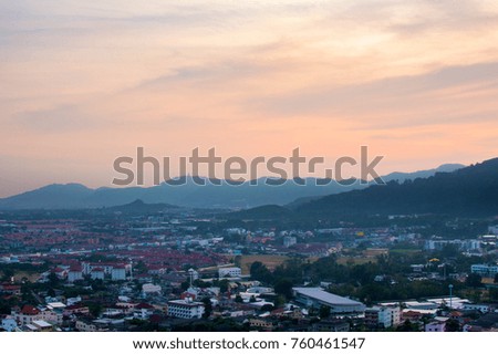 This is a panoramic view on the mountain viewpoint. See the city and the sea in the distance. Beautiful evening sky It is a great place to take pictures and relax.