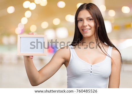 Business woman holding a banner
