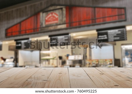 Empty table in front of blurry coffee shop or cafe restaurant with abstract bokhe light background Ready for Create montage product display or design key visual layout banner or panoramic