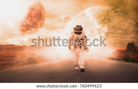 An astronaut just landed on the new planet walks in the middle of a street and behind the astronaut can see the planet still to be explored. Concept of: explorer, astronaut, discovery, science.
