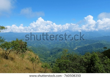 landscape view image of peak mountain with blue sky fog and cloudy background.concept nature in thailand 