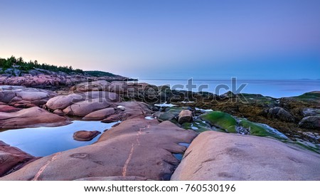Blue hour on the coast of St-Lawrence river, Quebec, Canada Royalty-Free Stock Photo #760530196