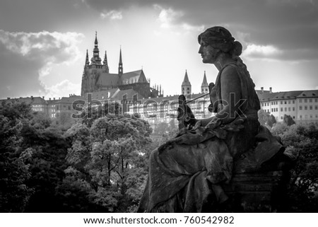 Rudolfinum Statue and Prague Castle Royalty-Free Stock Photo #760542982