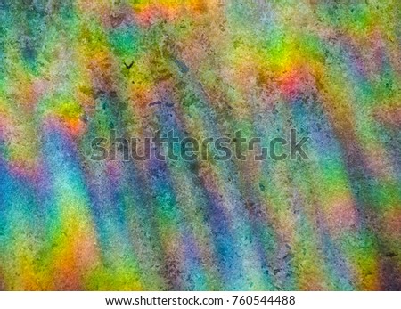Abstract multicolored rainbow background (refraction of sun light on a stone background)