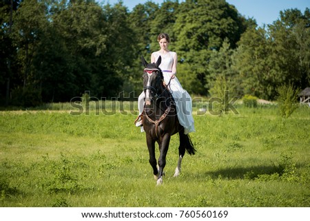 Bride on a brown horse