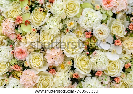 Beautiful artificial flowers background for wedding scene, free space. Floral background, copy space, view from above. Holiday greeting card for Valentine's Day, Woman's Day (March 8), Mother's Day