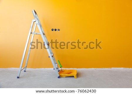 Home Improvement /  ladder, paint can and paint roller Royalty-Free Stock Photo #76062430