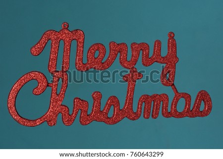 a red merry Christmas glitter sign 