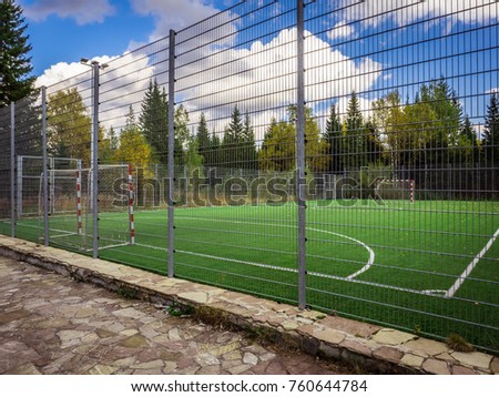 Soccer ( football ) field marks. Training base in a cozy forest suburb.
