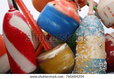 Close up landscape picture of colorful fish, net and crab buoys captured in Provincetown, Massachusetts, USA