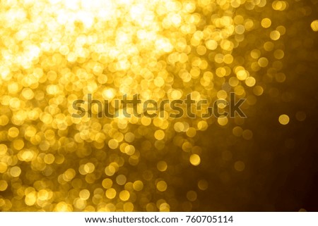 Gold glitter abstract background with bokeh defocused lights christmas