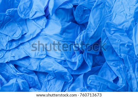 Pile of blue nitrile gloves