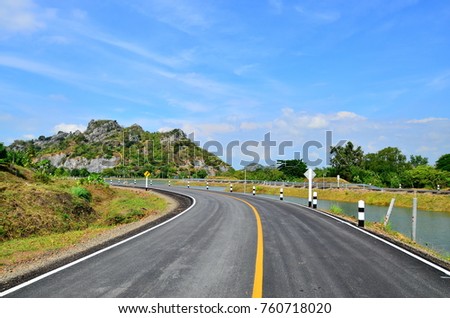road sharp curves in country side hill background Thailand.