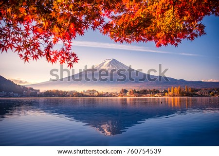 Colorful Autumn Season and Mountain Fuji with morning fog and red leaves at lake Kawaguchiko is one of the best places in Japan Royalty-Free Stock Photo #760754539