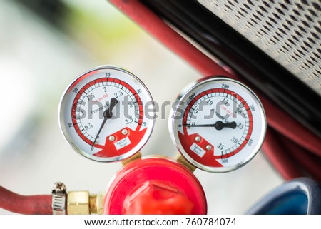 The pressure gage and valve on lpg tank