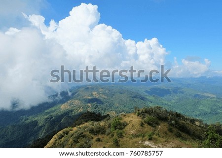 landscape nature image of blue sky and big cloudy with mountain and valley. shoot picture from top hill. 