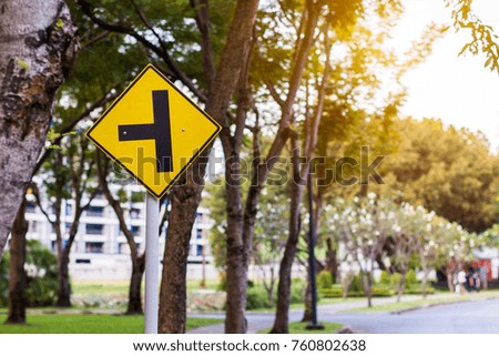 warning yellow traffic sign for safety and crossroads