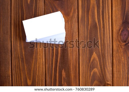 Business card on a wooden background
