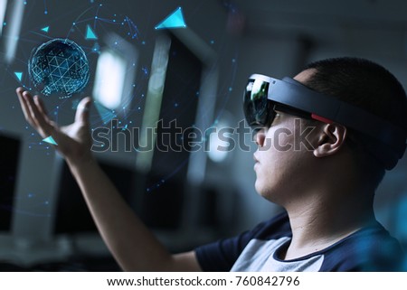 Playing magic | Virtual reality with hololens 1 headset in the lab Royalty-Free Stock Photo #760842796