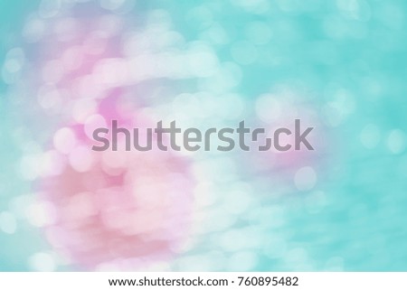 Blue purple pink bokeh with white color abstract background can be use as wallpaper, Christmas card background or new year card background. The background show light bokeh which on defocused light.