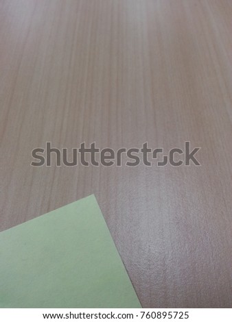 Paper on wooden floor with copy space for text