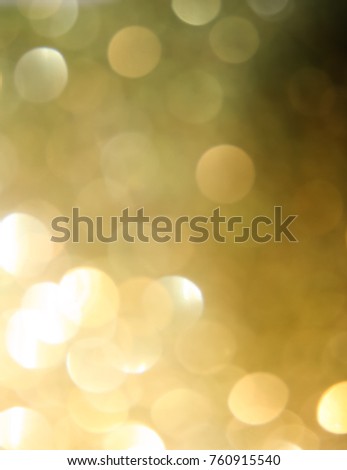 A golden glowing abstract bokeh texture/overlay.