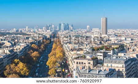 Paris, panorama from Arc de Triomphe, buildings, avenues and la Defense in background 
