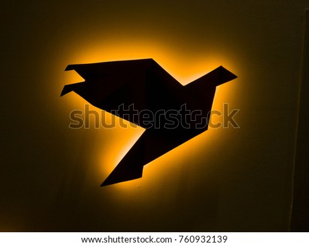 Bird with orange back light 