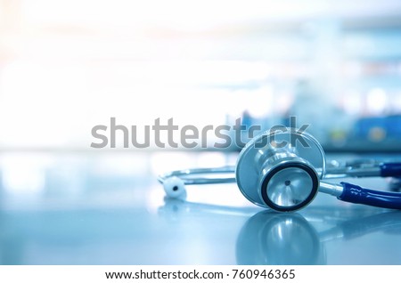 stethoscope for doctor checkup on health medical laboratory table background Royalty-Free Stock Photo #760946365