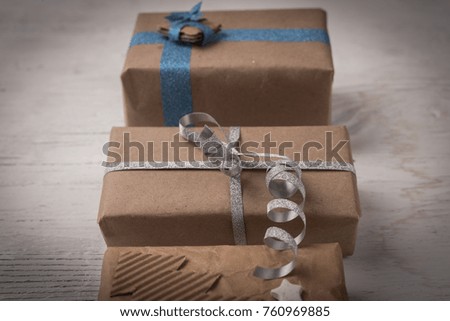 Gift boxes on wooden background, holiday concept