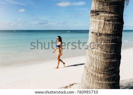 Young woman relax on the beach. Holidays Concept.