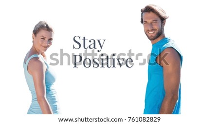 Digital composite of Stay positive text and fitness couple