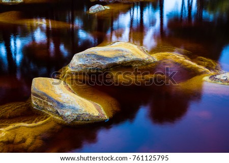 Rio Tinto - red river in Andalusia, Spain. iron and other minerals in the water responsible for amazing color of the rocks and water.