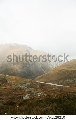 Foggy autumn day in the mountains. On Sankt Gotthard, near the Rhone Glacier 